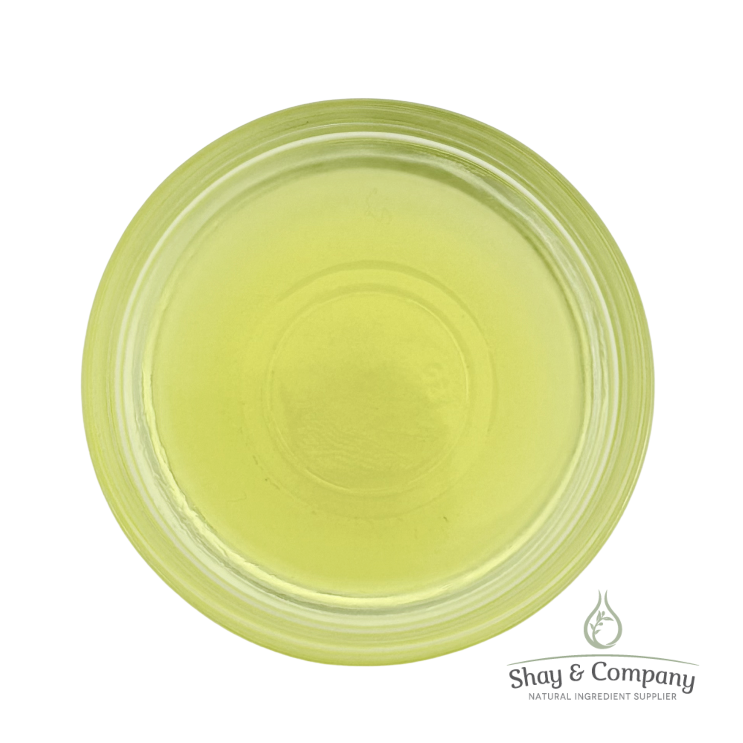 Pale yellow-green oil or liquid in a clear circular container with Shay & Company natural ingredient supplier logo.