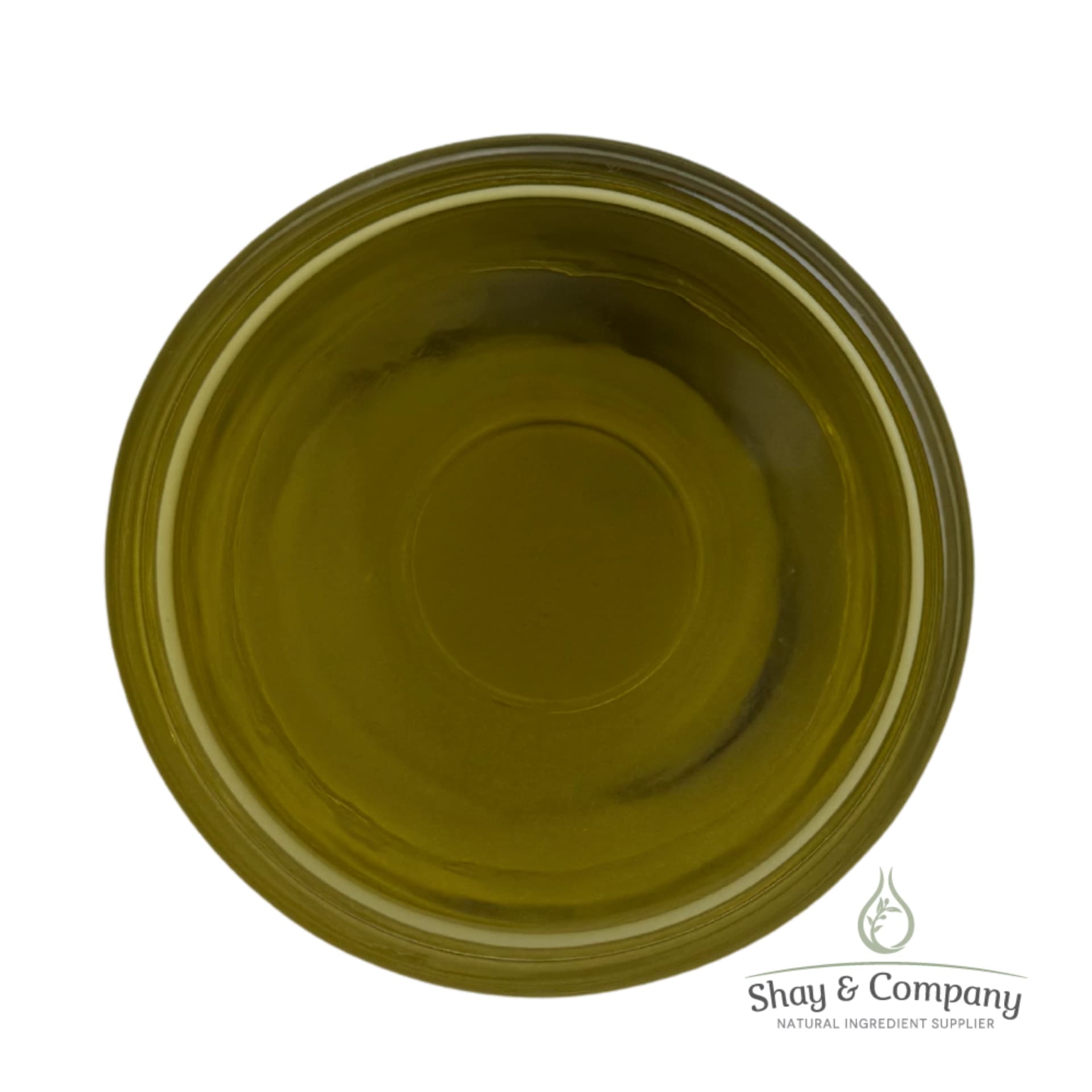 Top-down view of golden-green olive oil in a clear glass dish with Shay & Company logo watermark.