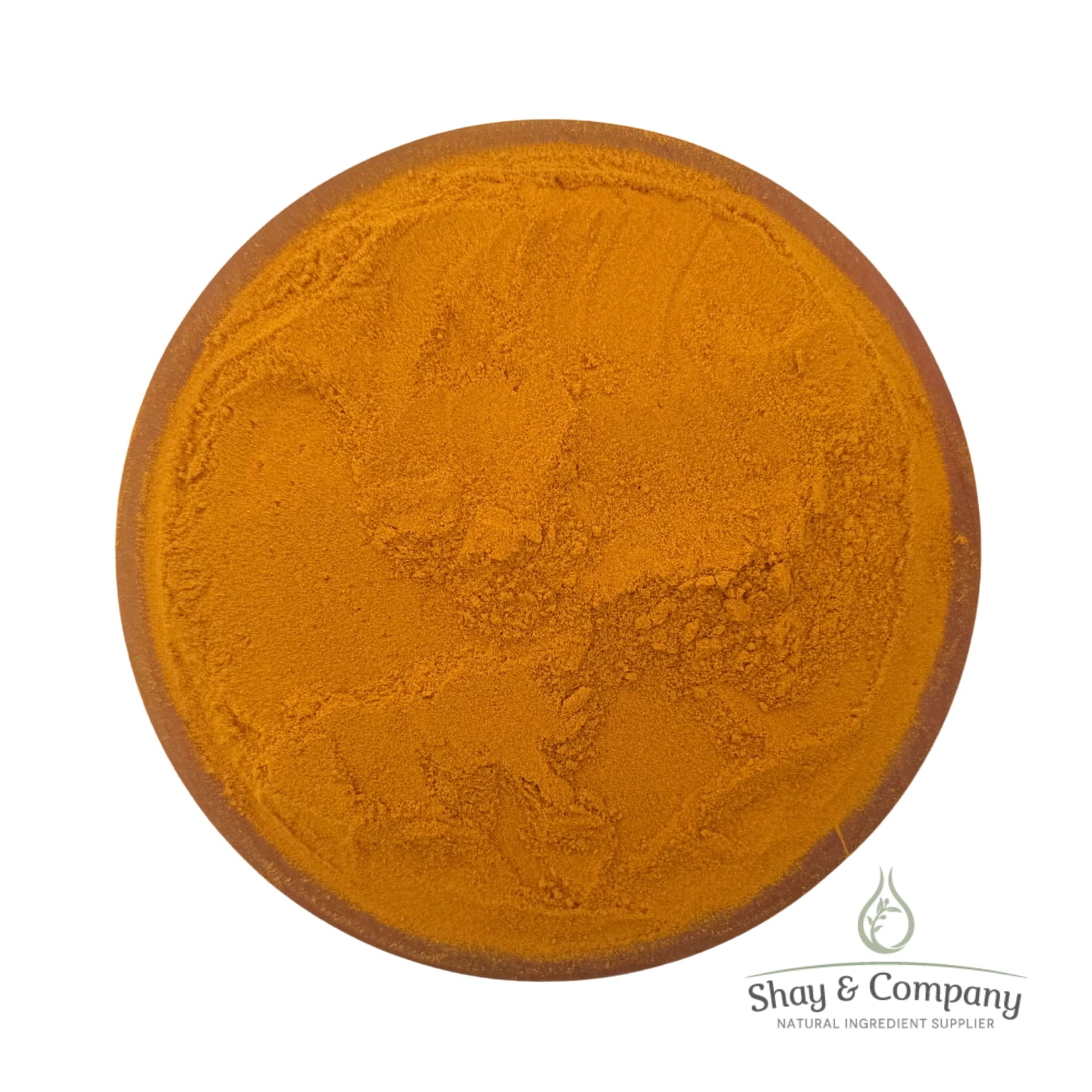 Turmeric powder in a wooden bowl from Shay & Company natural ingredient supplier.