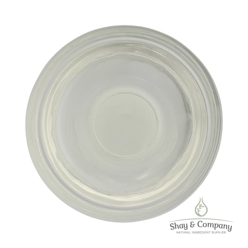 Clear glass bowl with concentric circular ridges viewed from above on white background.