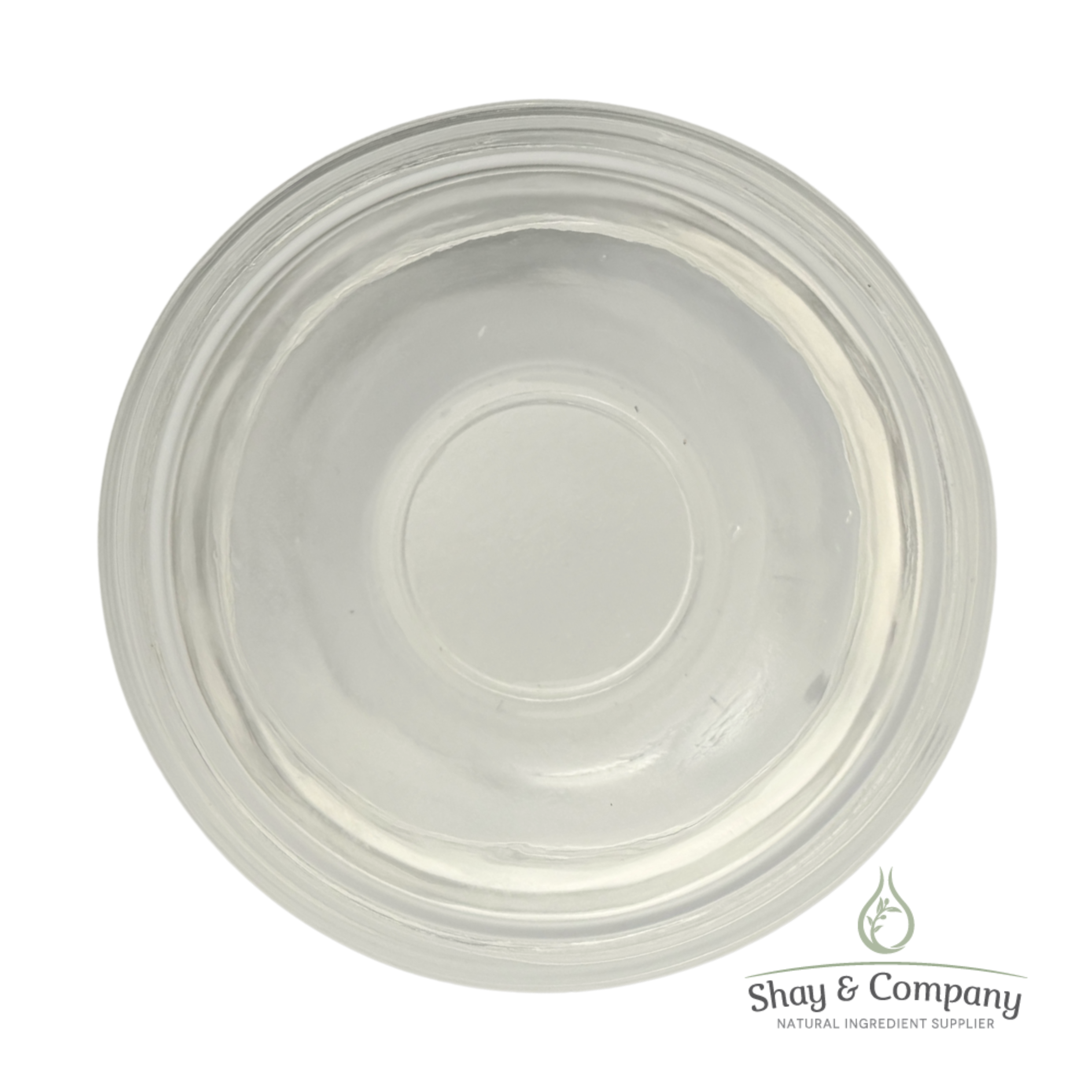 Clear glass jar with concentric rings viewed from above, Shay & Company natural ingredient supplier logo below.
