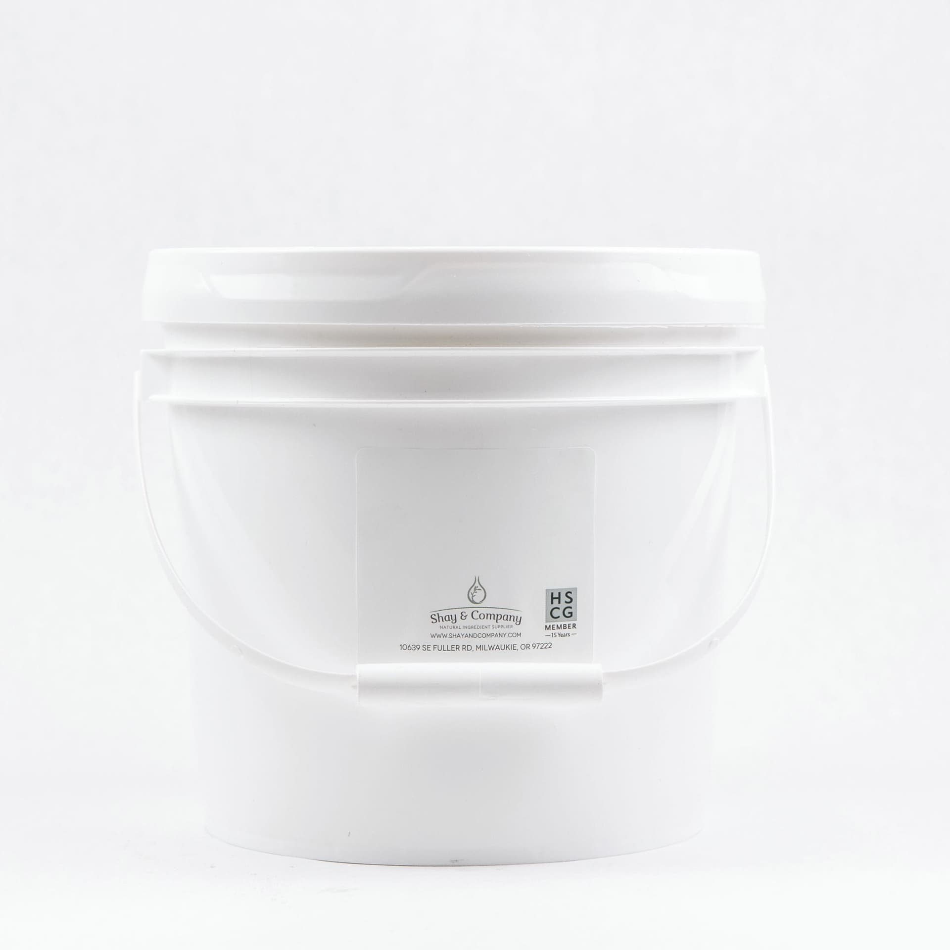 White ceramic jar with lid from Shay & Company, featuring branding and HSCG member logo on front.