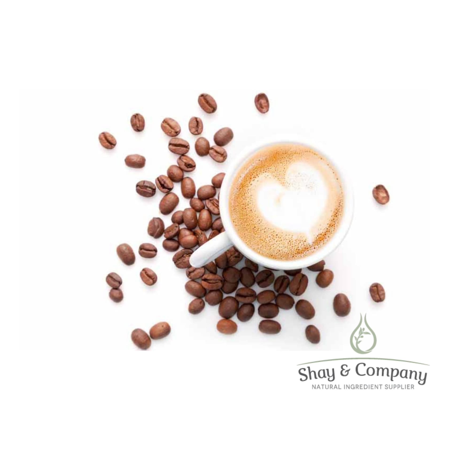 Coffee beans on a white background with a cup of foamy latte