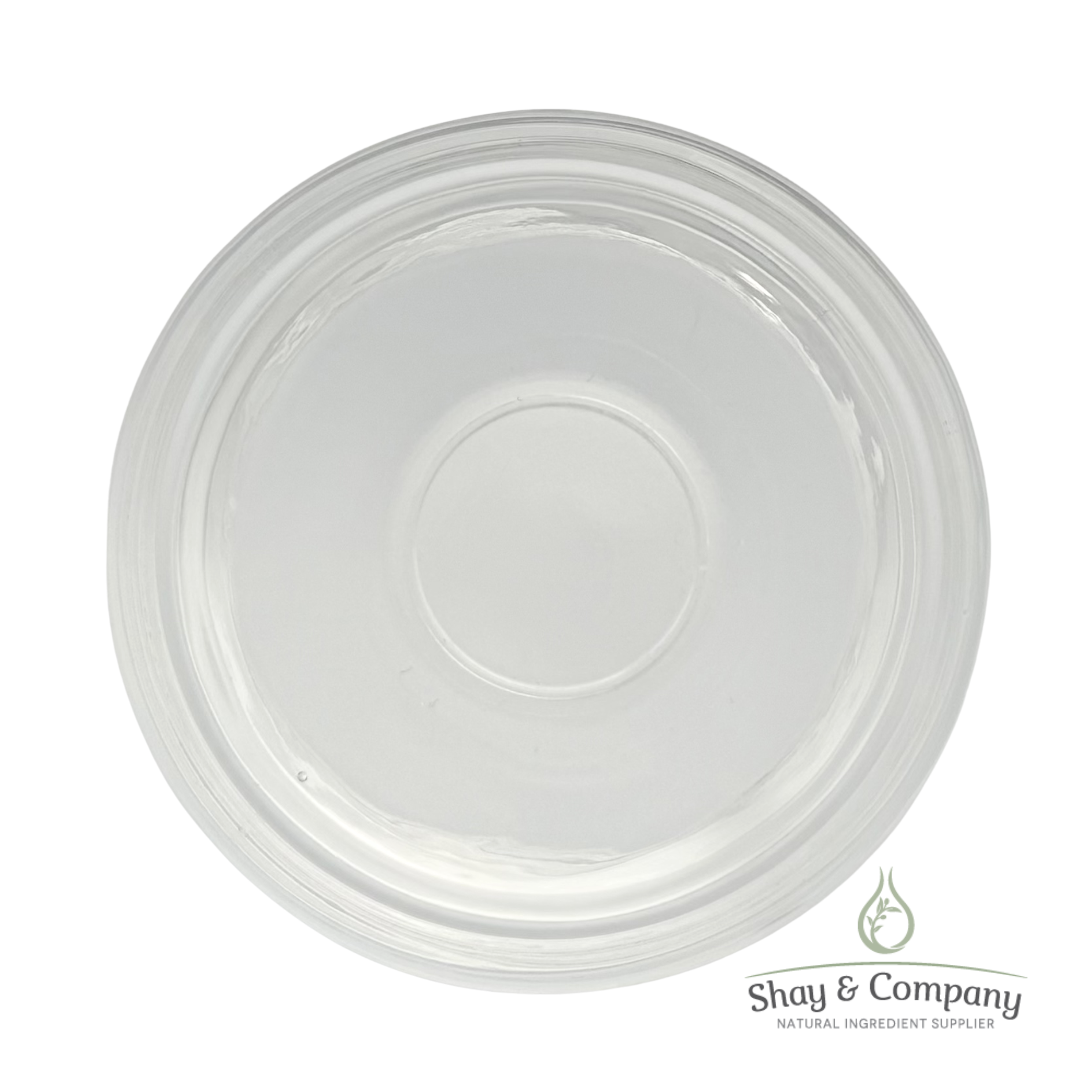 Clear plastic container lid with concentric circles viewed from above, branded with Shay & Company logo.