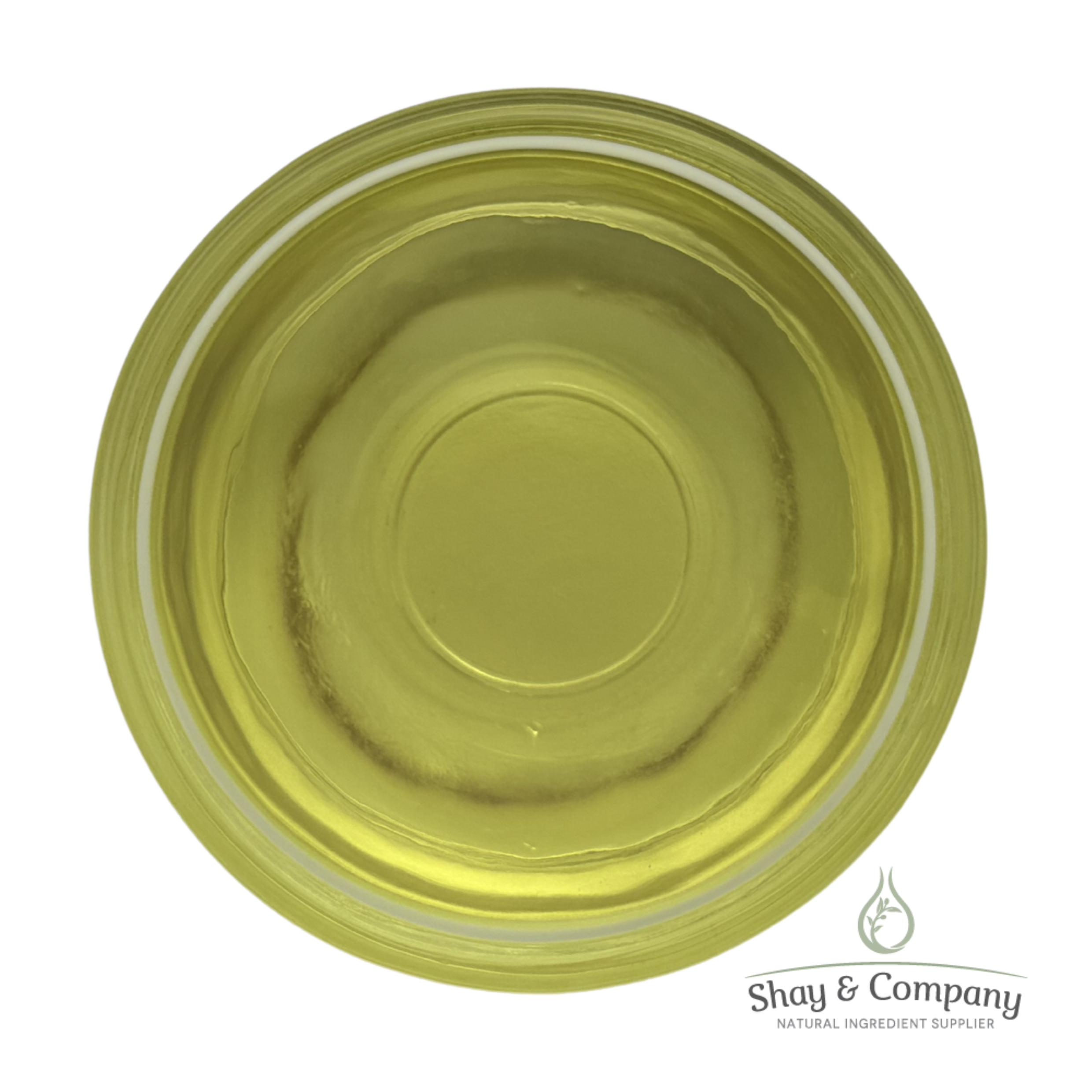 Vibrant yellow-green oil in a clear glass bowl viewed from above, branded with Shay & Company natural ingredient supplier logo.