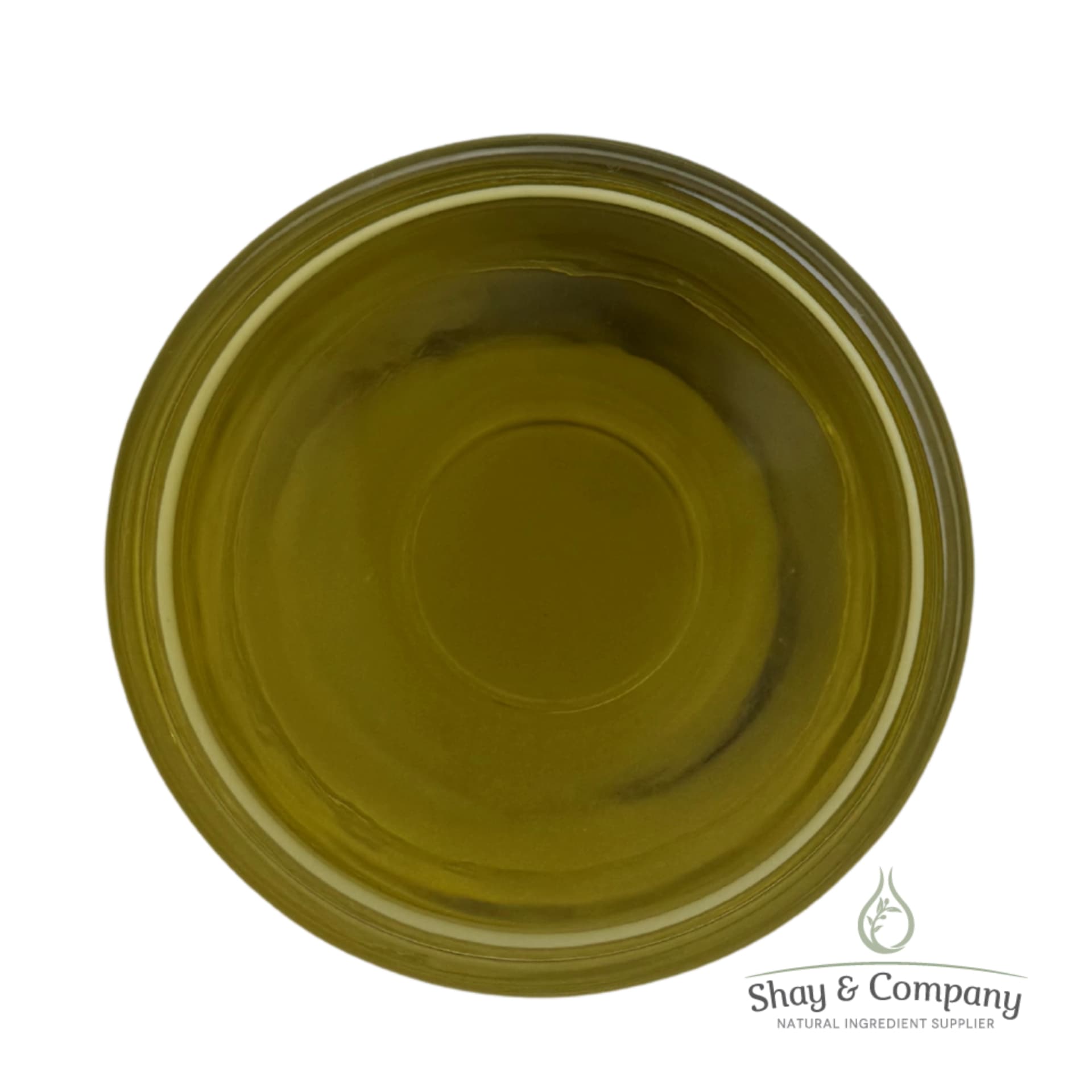 Top-down view of golden-green olive oil in a clear glass dish on white background.