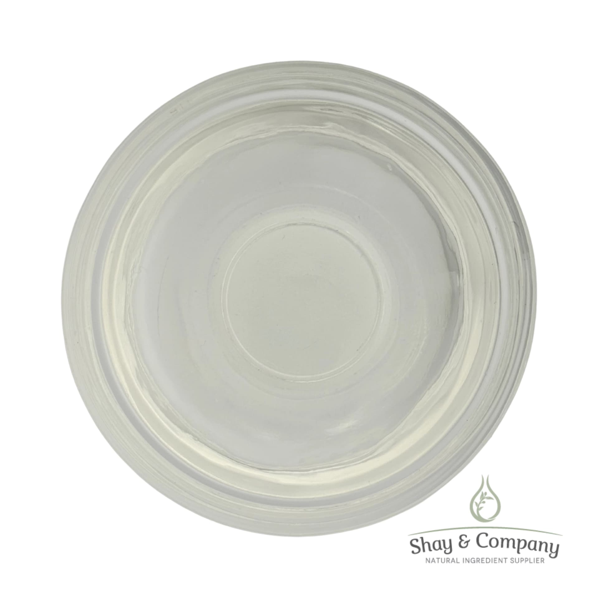 Clear glass bowl with concentric circular ridges viewed from above on white background.