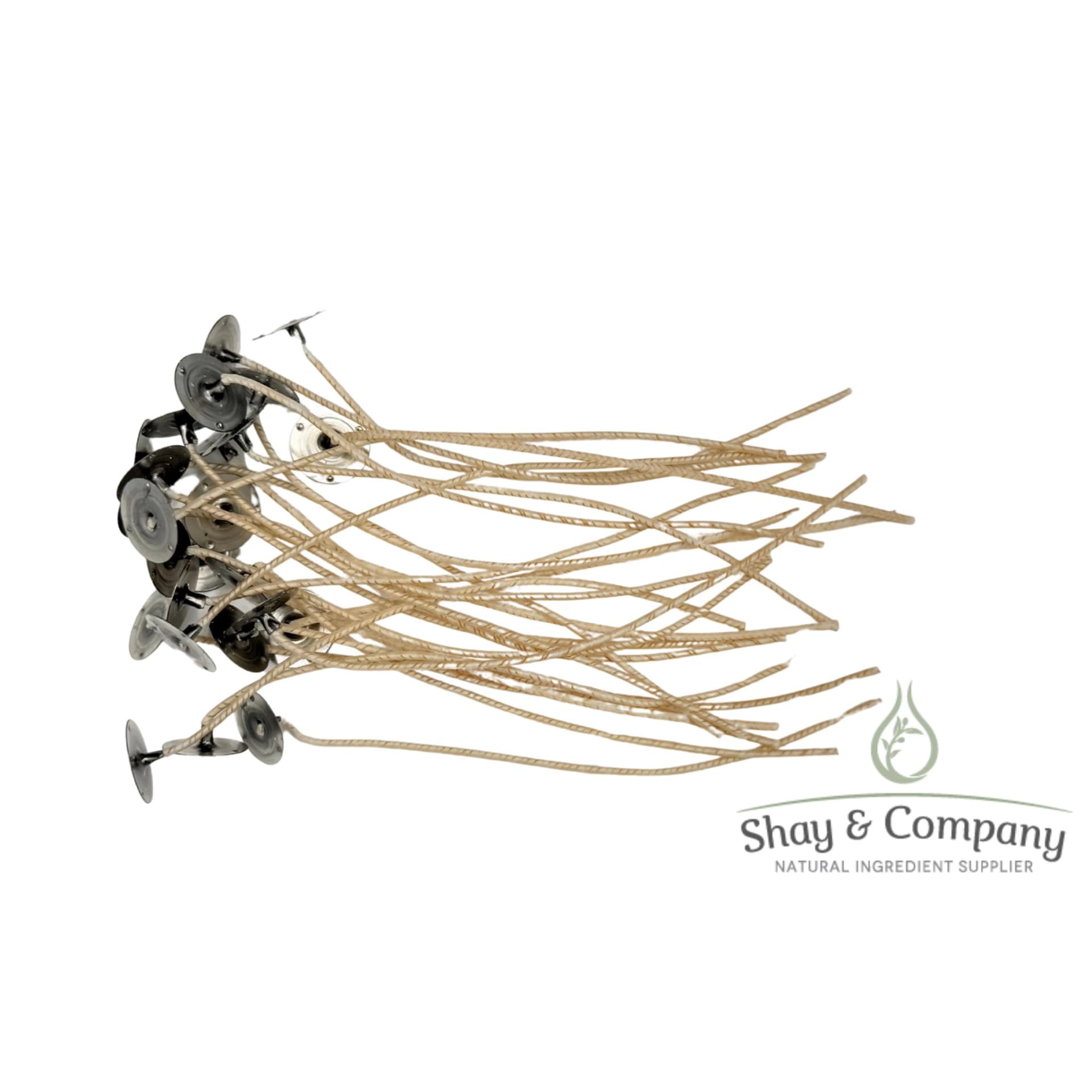 Shay & Company natural ingredient supplier showcases decorative metal plant supports with twine wrapping.
